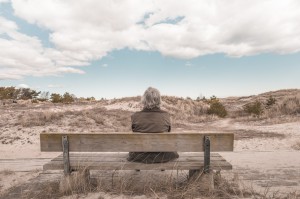 older woman on a bench